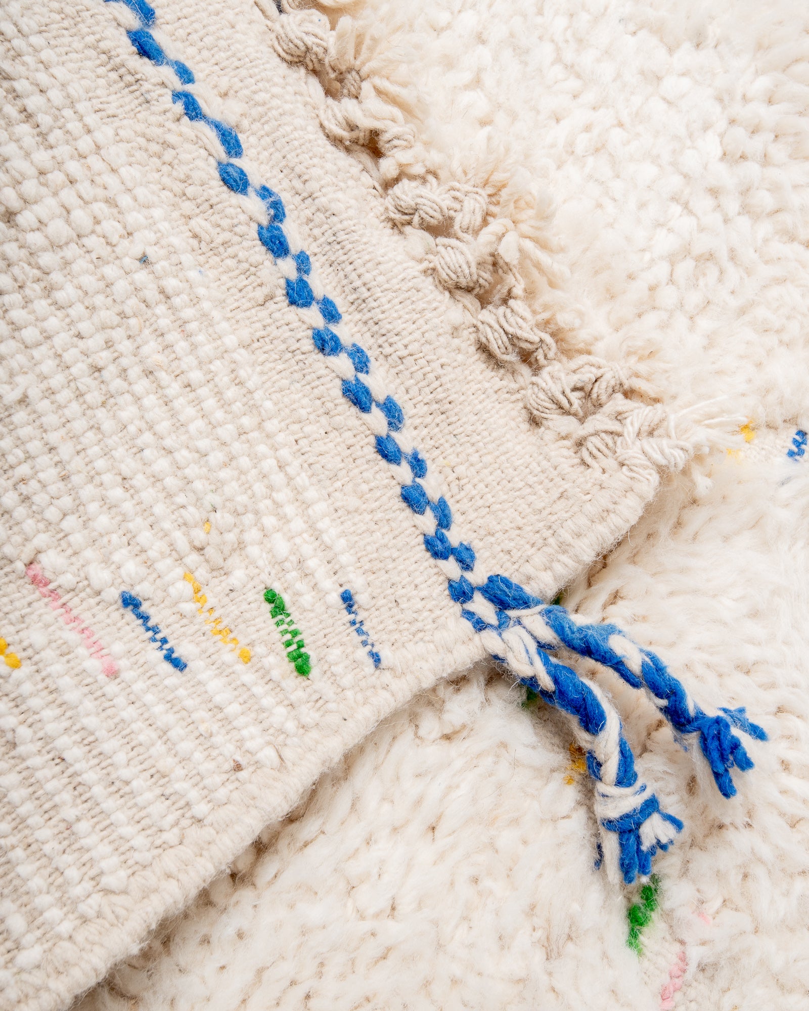 Modern, designer, handcrafted Berber rug from Morocco. Beniourain carpet with beautiful colours and patterns and fluffy wool texture.